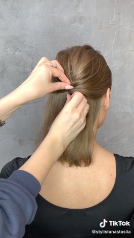 beautiful half up hairstyle sure to impress, Pinning the ponytails together