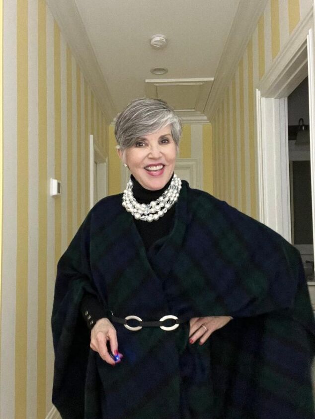 what i wore to nyc in december, I am again in the black watch poncho but you can see how I belted just the front of it with a black and silver belt