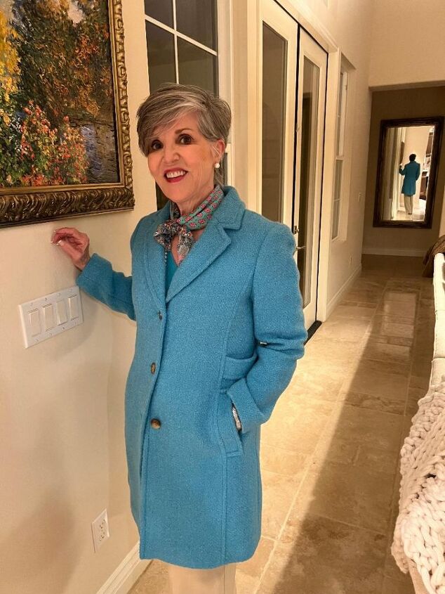 seven smart casual winter outfits and lots of fun style tips, This is the first outfit of the seven smart casual winter outfits A turquoise boucle coat is worn over a turquoise cashmere sweater and tan wide leg trousers