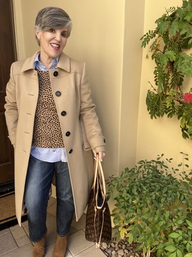 seven smart casual winter outfits and lots of fun style tips, Here is an animal print top worn over a light blue shirt with cropped straight jeans and brown booties and a brown bag I added a tan camel s hair coat