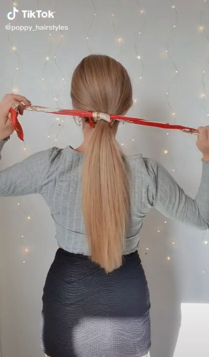 valentine s day hair inspo for a new look, Tying a low ponytail