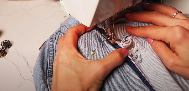 how to diy custom fitted ripped jeans, Sewing the new seams