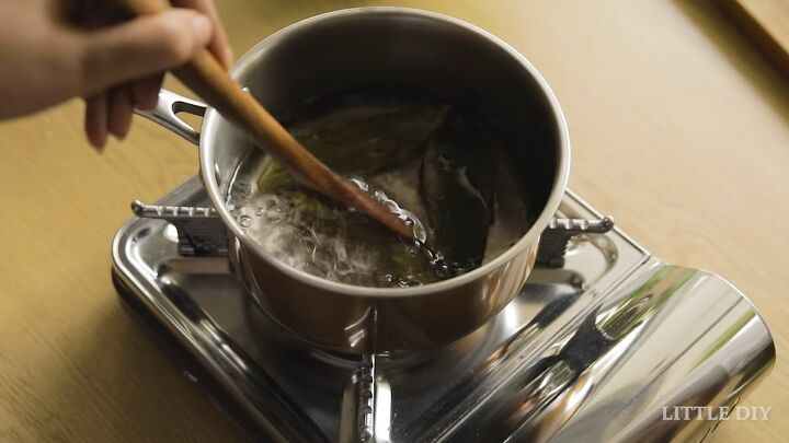 how to make a bay leaf spray and a neem scalp mask for healthy hair, Simmering