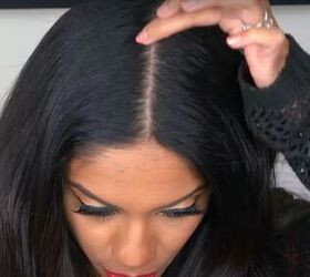 She parts her hair down the middle for this impressive braid idea