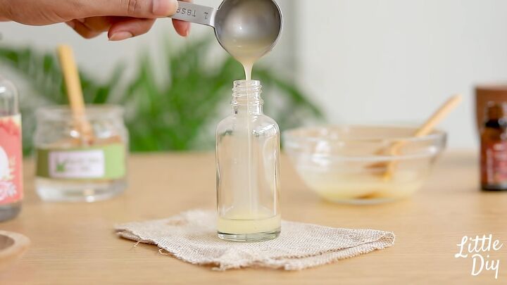 how to diy a super easy face serum and mist for glowing skin, Transferring mixture
