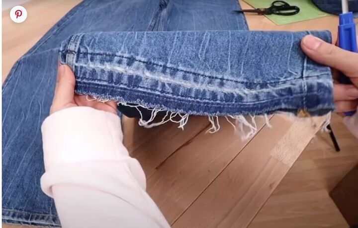 how to fray the bottom of jeans in 7 easy steps, Photo from The DIY Designer Fraying jeans