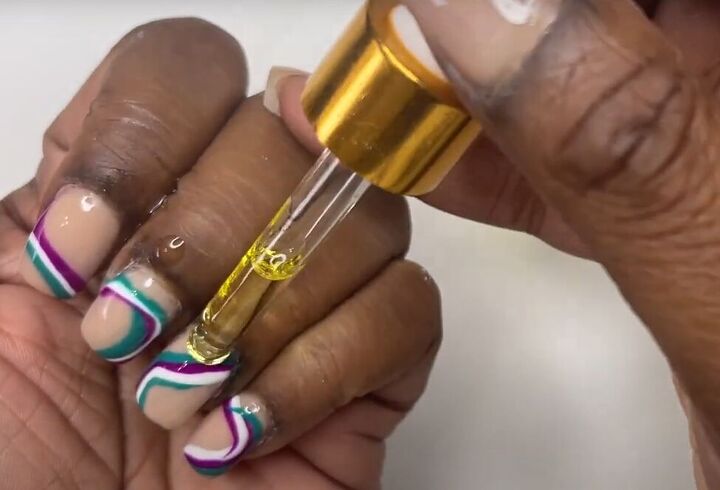 how to diy super cute nude nails with swirls, Adding cuticle oil