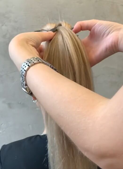wow this ponytail looks so cool and unique perfect for concerts, Adding hair elastic