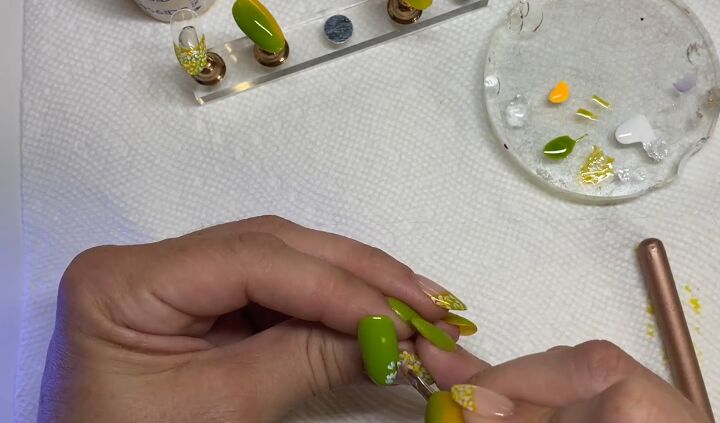 how to do an easy lime green french manicure for spring, Adding flowers to nail