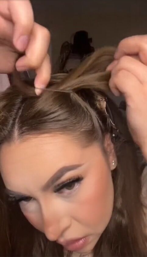 make 3 ponytails for this voluminous hairstyle, Tying hair with elastic