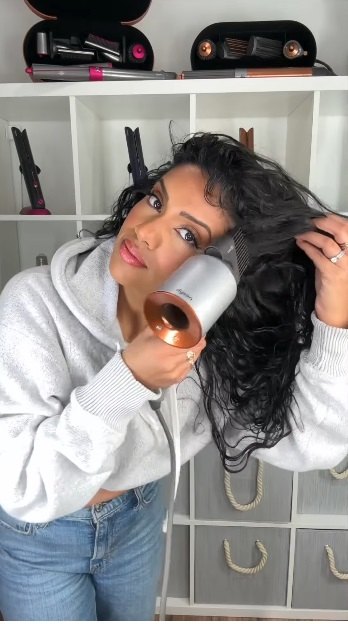 get voluminous hair in minutes with this super easy hack, Blow drying hair