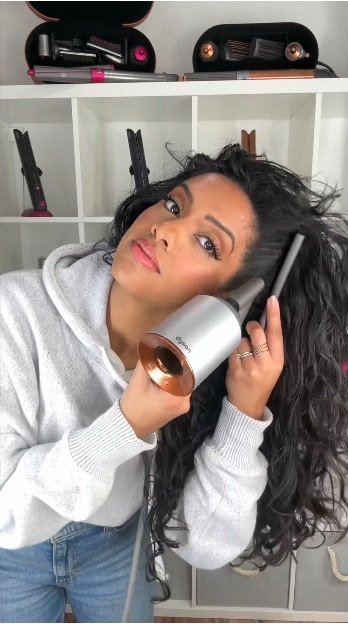 get voluminous hair in minutes with this super easy hack, Blow drying hair