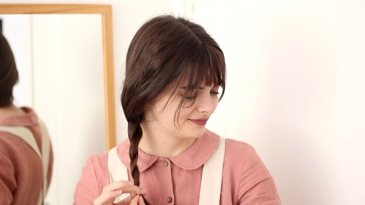 15 quick and easy cottagecore hairstyle ideas, Loose braid with a floral headband