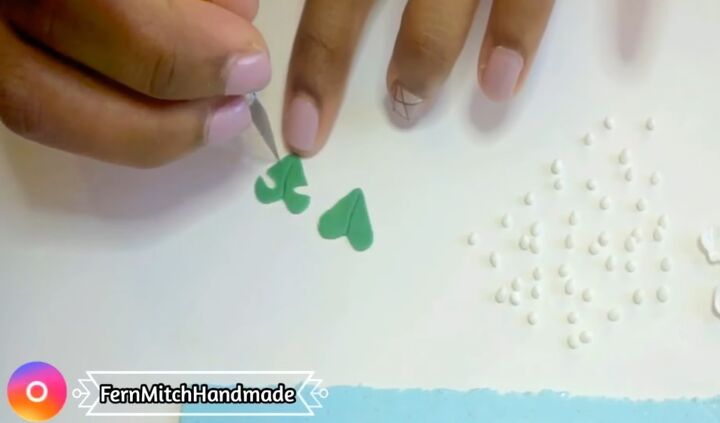 how to diy monstera leaf earrings from polymer clay, Cutting notches
