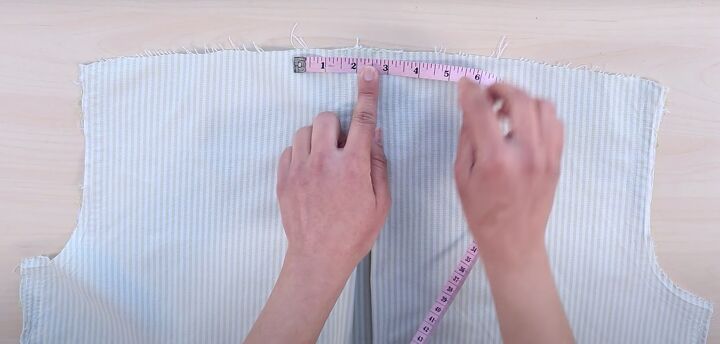 how to upcycle a men s shirt into a cute bow top, Creating halter neck