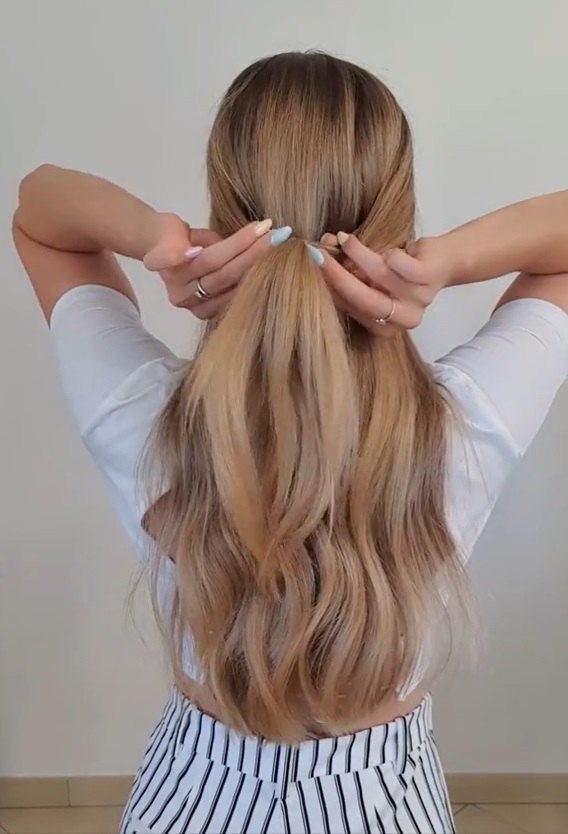 grab a silk scarf and upgrade your braid like this, Creating a half ponytail