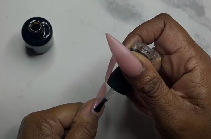 how to diy tiktok trending pink glazed donut nails, Applying clear base coat