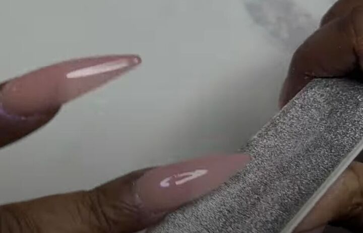 how to diy tiktok trending pink glazed donut nails, Filing nails