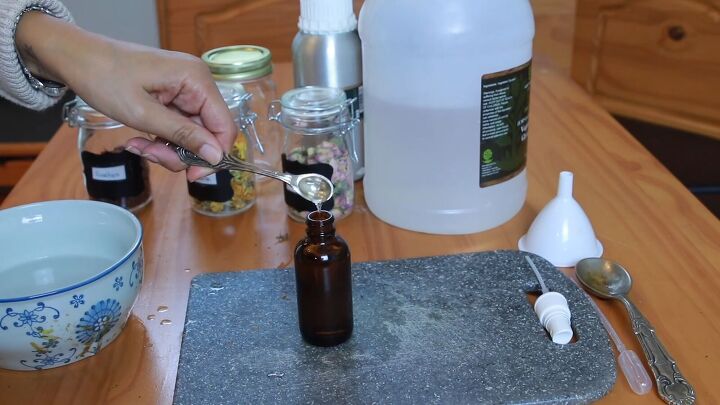 how to diy an easy anti aging rose water cleanser and toner, Adding vitamin E glycerin and essential oil
