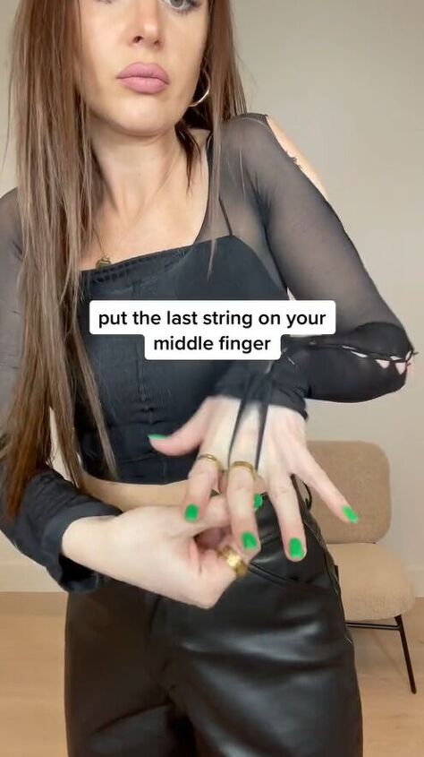 wow turn pantyhose into your next favorite top, Pulling last string around finger