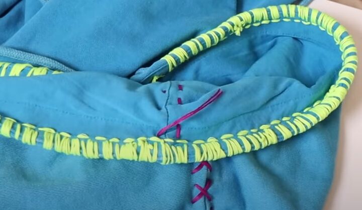 how to diy a cute embroidered hoodie for spring, Securing the thread