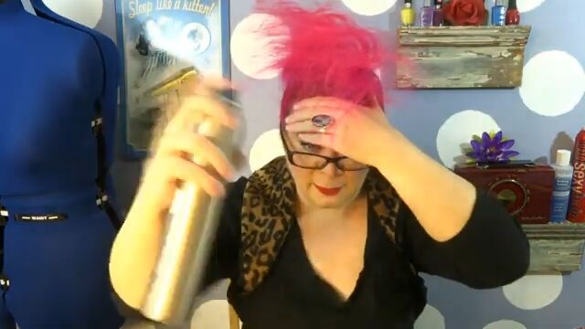 glam ballerina bun tutorial, Applying hairspray