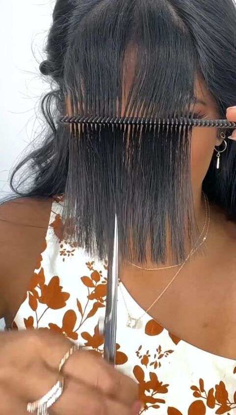 how to cut long curtain bangs the easy way, Trimming hair
