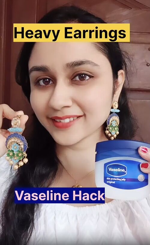 super easy heavy earrings hack, Applying Vaseline