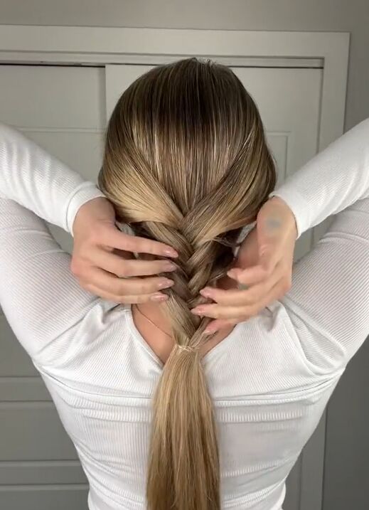 the easiest shortcut to this braided look, Pulling at braid