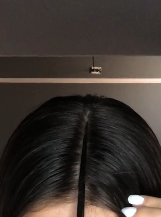 all the tiktok girlies wear this hairstyle, Parting hair down middle