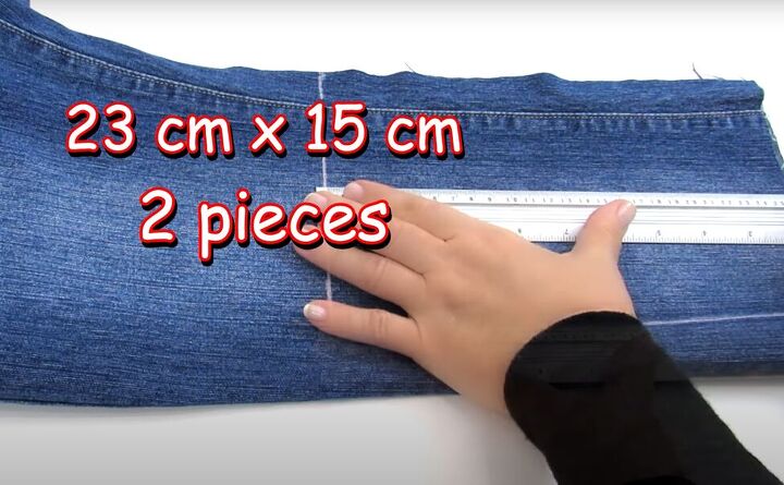 how to diy a cute floral cosmetic bag, Cutting jeans