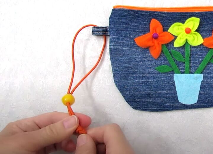 how to diy a cute floral cosmetic bag, Adding strap