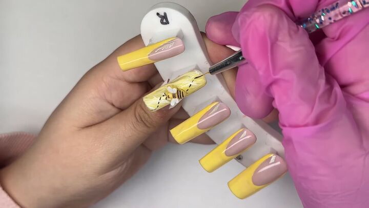 how to create cute french tip yellow nails for spring, Spring nail design with a bee