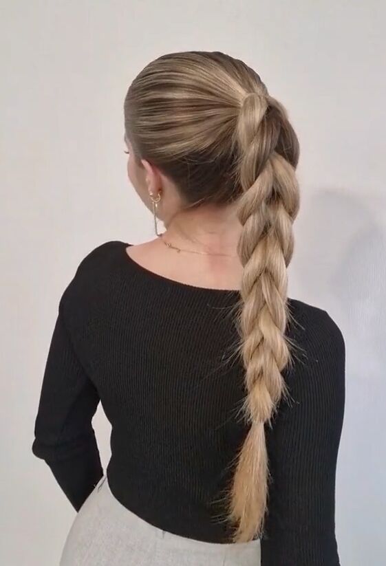 try this hack instead of braiding your ponytail, Faux braid ponytail