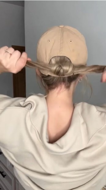 how to wear a cute low bun hairstyle with hat, Tying knot
