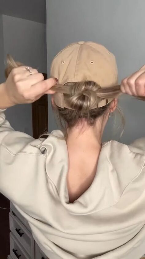 how to wear a cute low bun hairstyle with hat, Tying hair