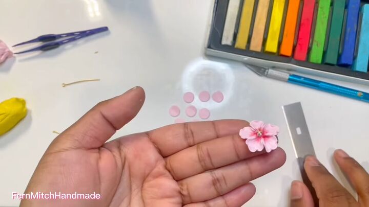 how to diy cute blossom earrings, Adding yellow balls