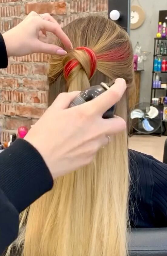 easy tutorial for getting the knotted bun look, Adding hairspray