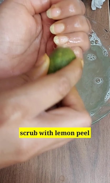 do this to turn your yellow nails white, Scrubbing nails