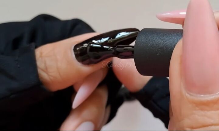 cute and easy black and white nail design for 2023, Applying black nail polish
