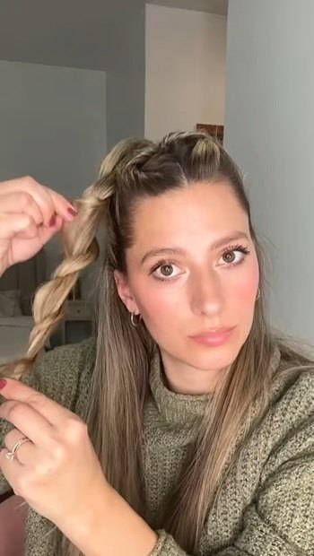 easy half up twist bun hairstyle tutorial, Pulling out braid