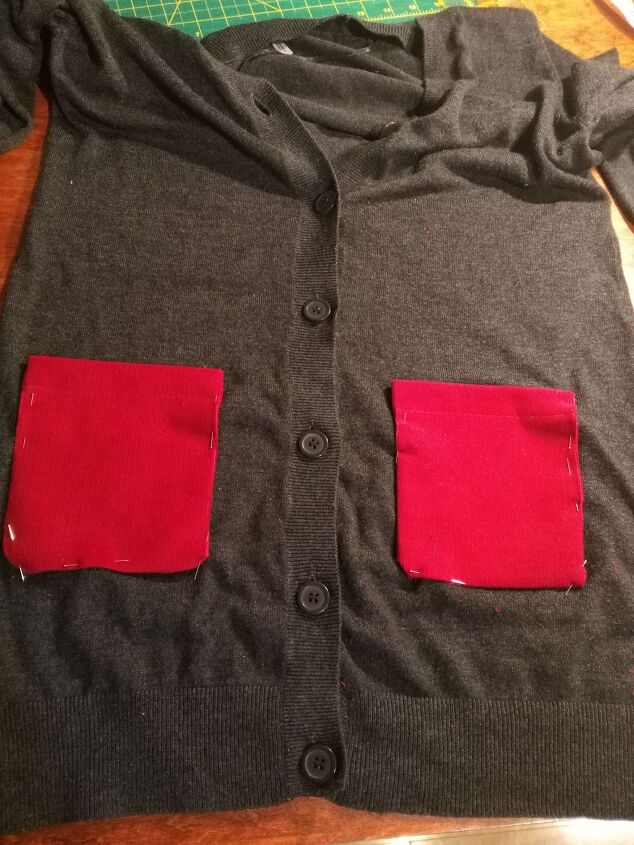 update an old cardigan with a patch pocket, Patch pockets pinned on cardigan