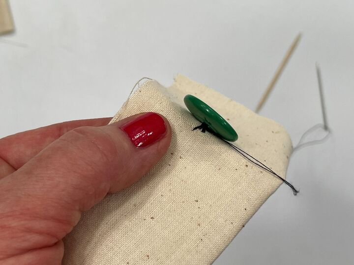 how to sew on a button simple hand sewing method, button two hole
