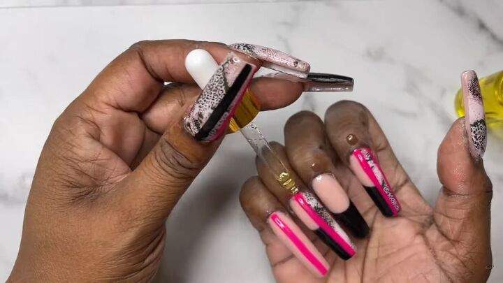 classy pink and black nails, Adding cuticle oil