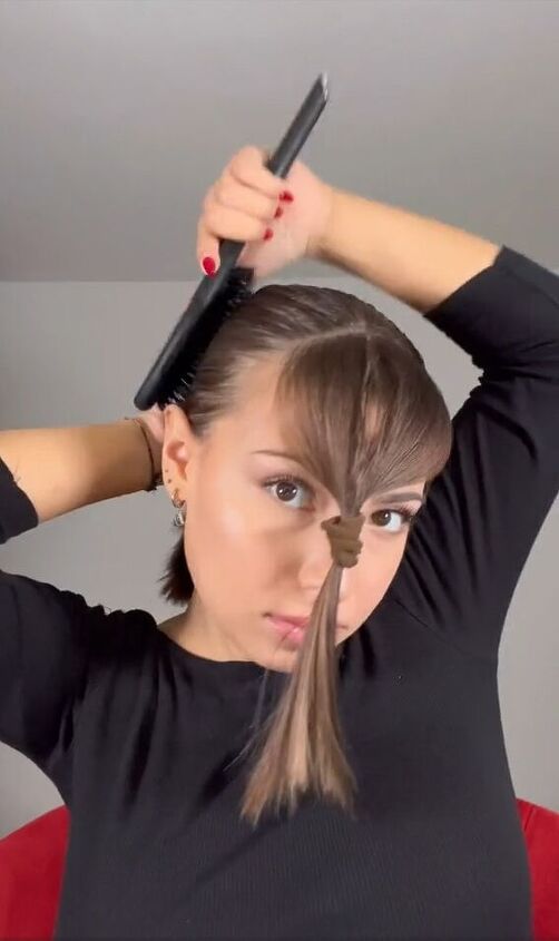 my easy hack for getting that slicked back look, Tying hair back