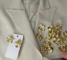 She cut the backs off her earrings and glued them to a blazer