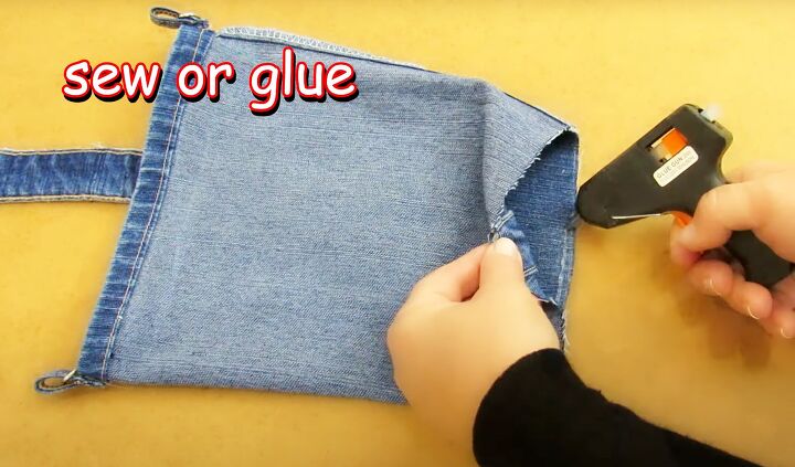 how to make bags from old jeans step by step, Lower edge