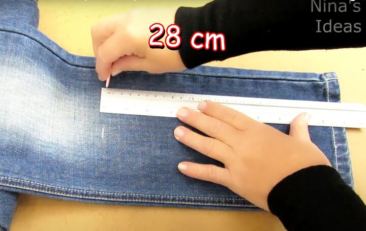 how to make bags from old jeans step by step, Cutting denim