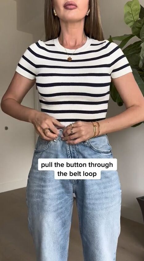 quick fix to make your jeans fit better no sewing needed, Pulling button through belt loop
