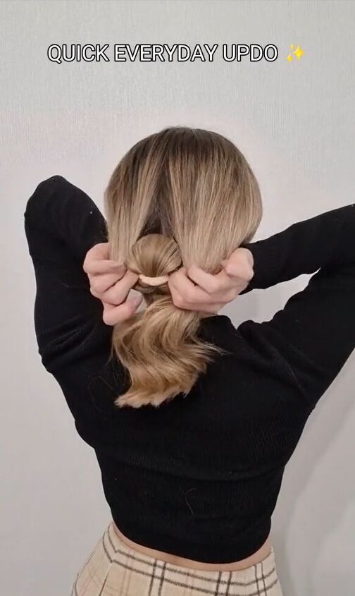 quick and easy everyday updo, Bringing hair through hole